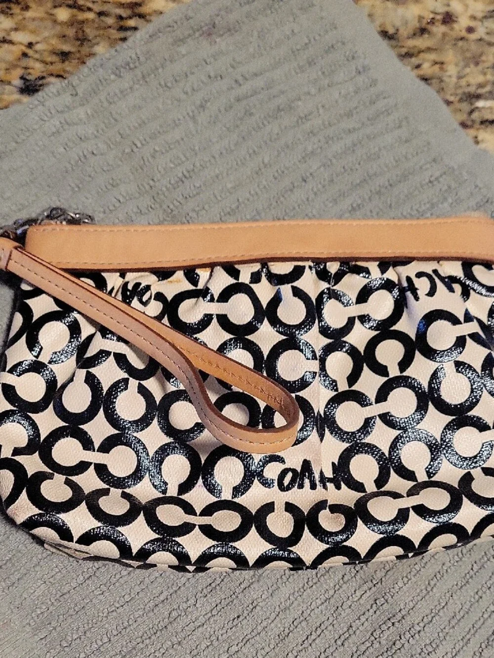 Coach Black and Cream Signature C Canvas Wristlet with Tan Leather Trim